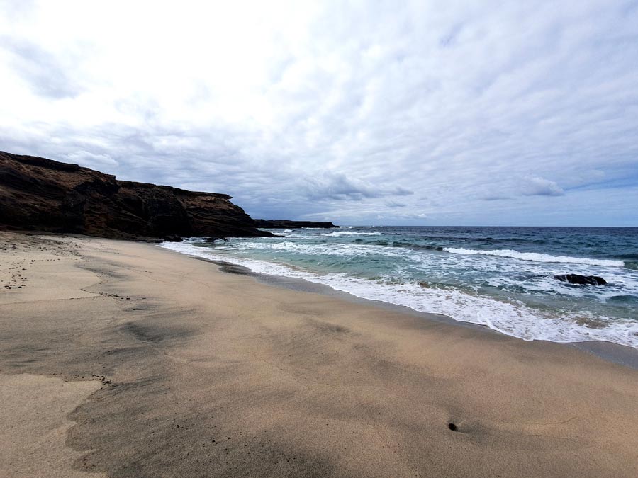 Fuerteventura im Januar Erfahrungen Klima: Dichte Wolkendecke über dem Sandstrand ganz im Süden von Fuerteventura